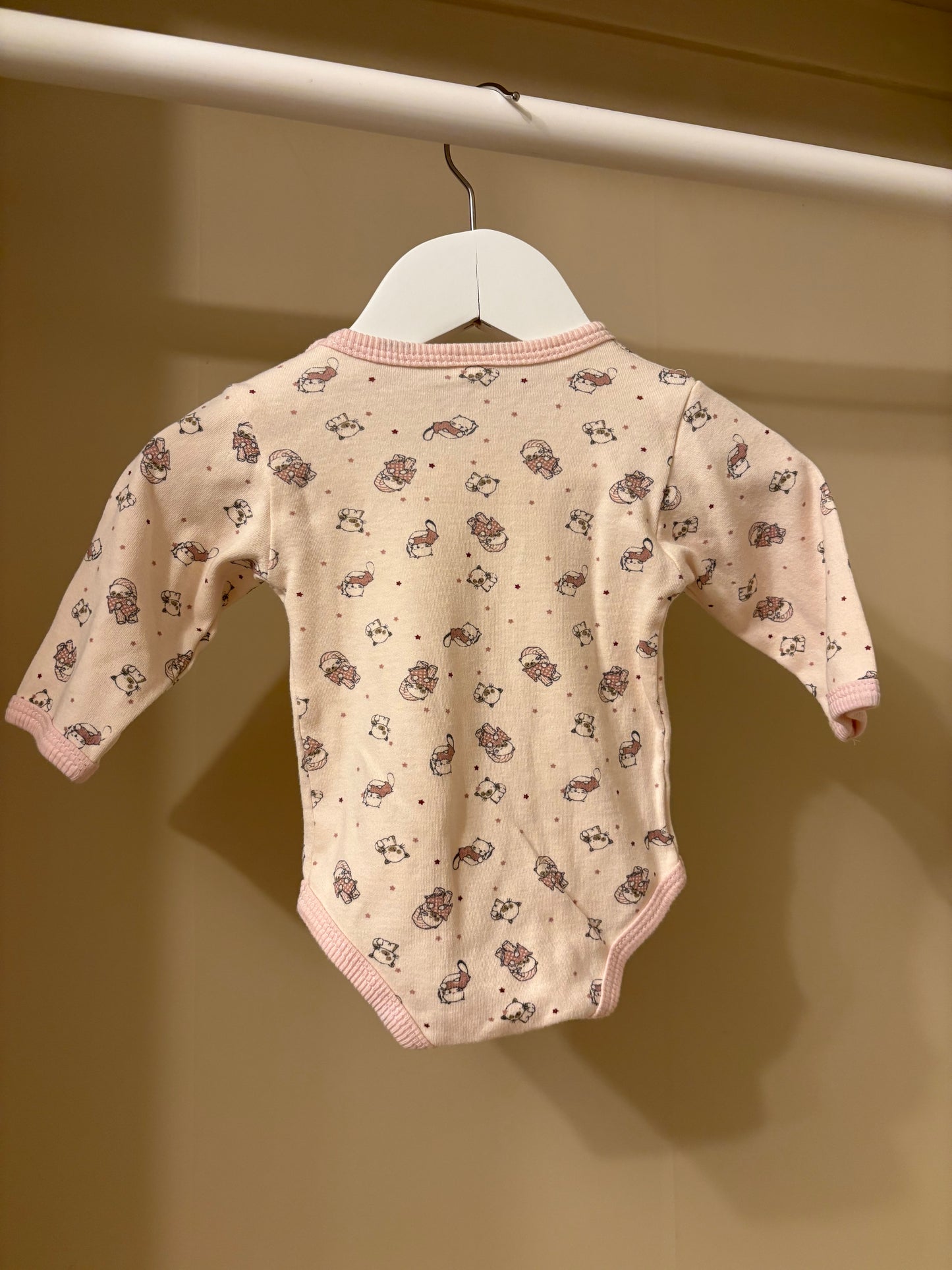 Body rosa m mönster stl 56 (1-2 mån)